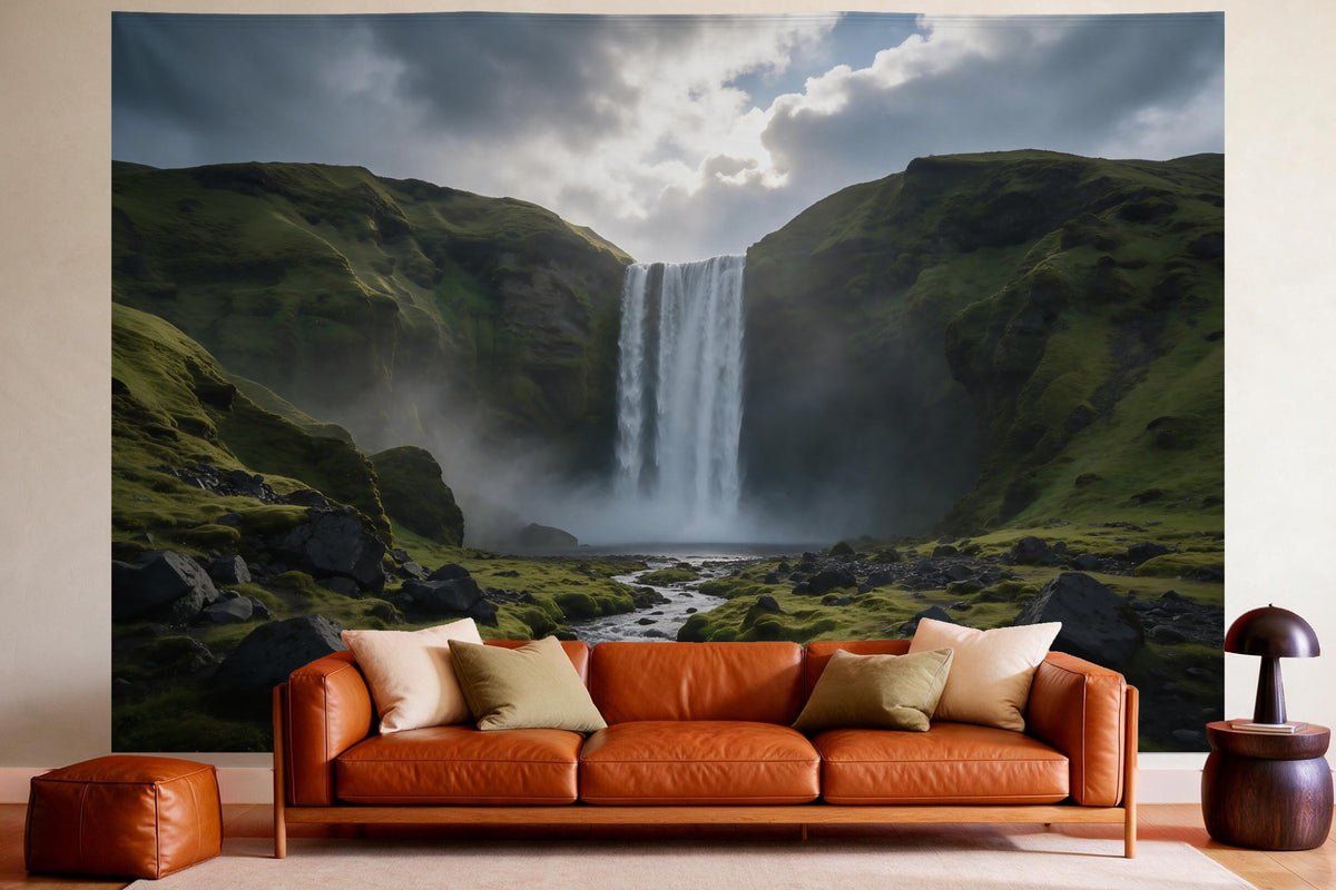 Wandtuch XXL Wasserfall in Island als Wanddeko im gemütlichen Wohnzimmer über dem Ledersofa