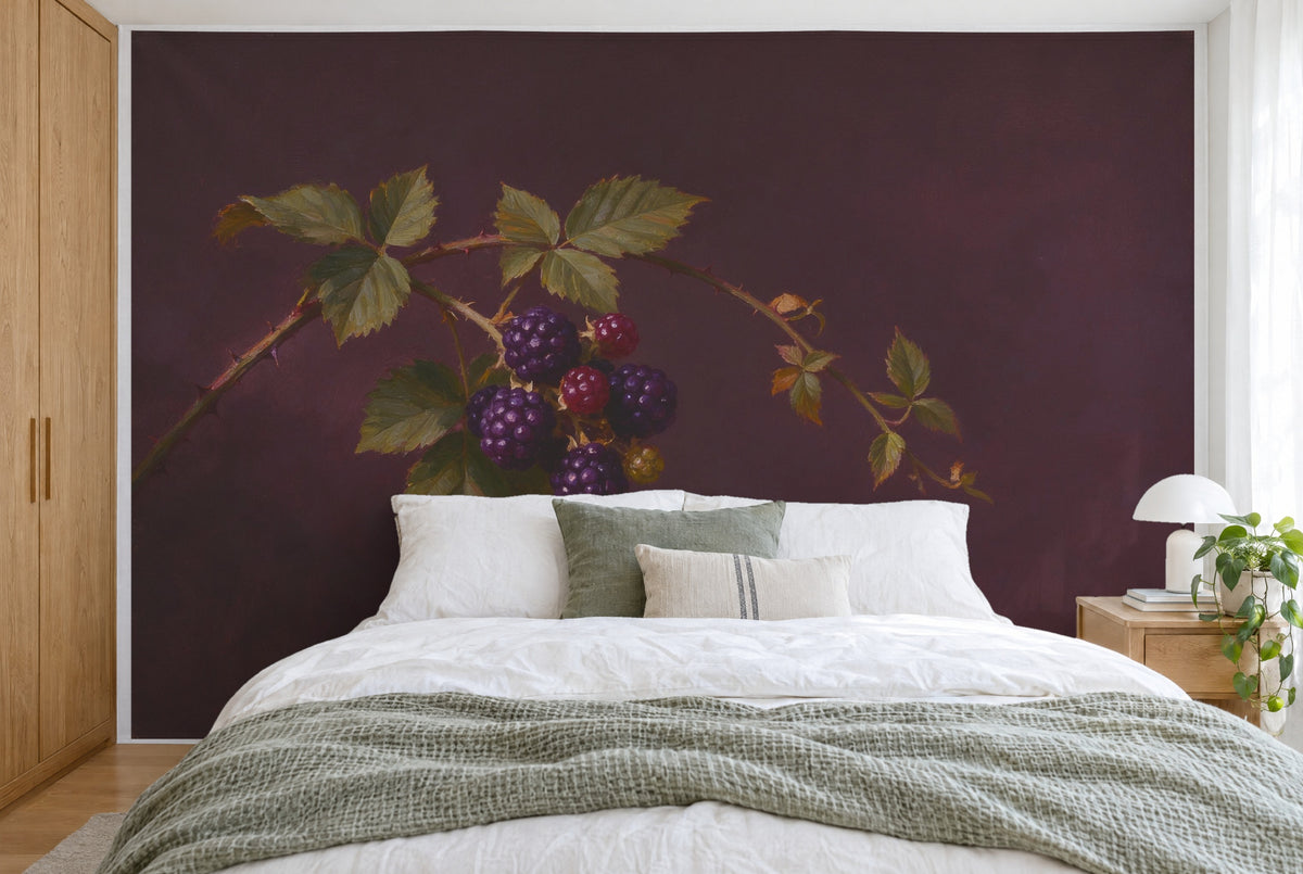 XXL printed fabric: blackberries left on a branch against dark plum ground, filling the wall behind the bed