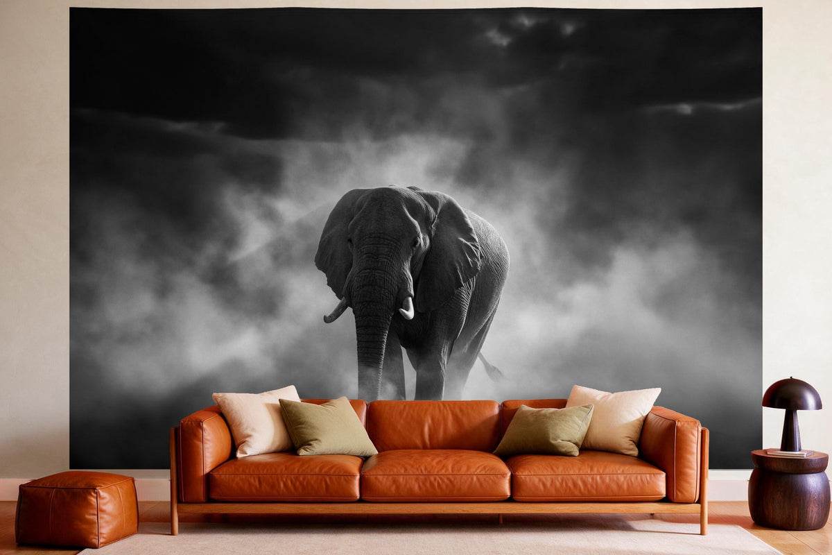 XXL wall tapestry Elephant in the Dust in Black and White as wall decor in a cosy living room above the leather sofa