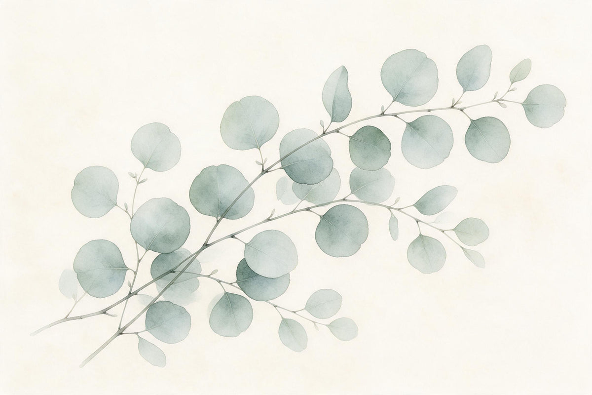Eucalyptus branches with round grey-green leaves running diagonally on cream, tapestry printed on fabric – green and beige