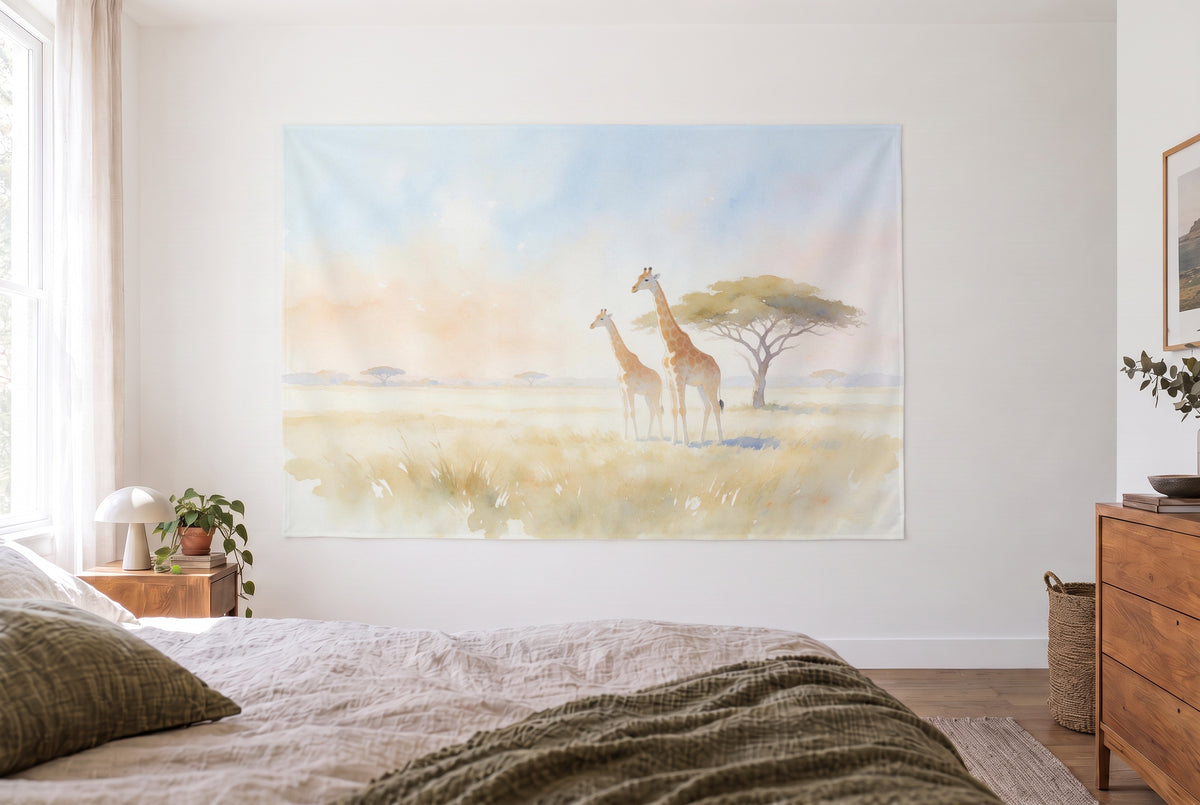Giraffes under acacias watercolor tapestry in a bright bedroom opposite the bed, wooden dresser at right – ochre