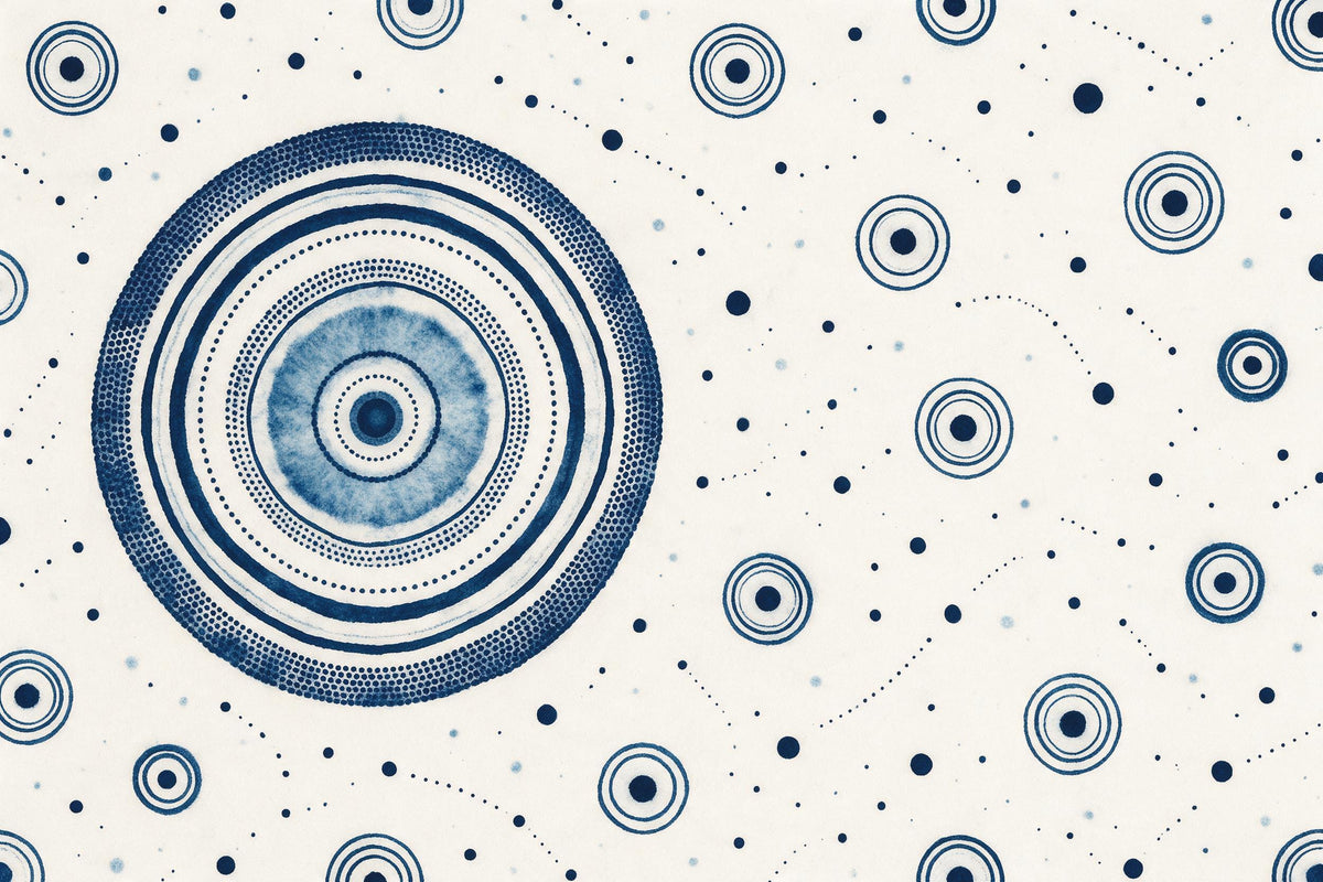 Batik pattern with a large ring circle on the left, small circles, dots and lines, tapestry printed on fabric – indigo