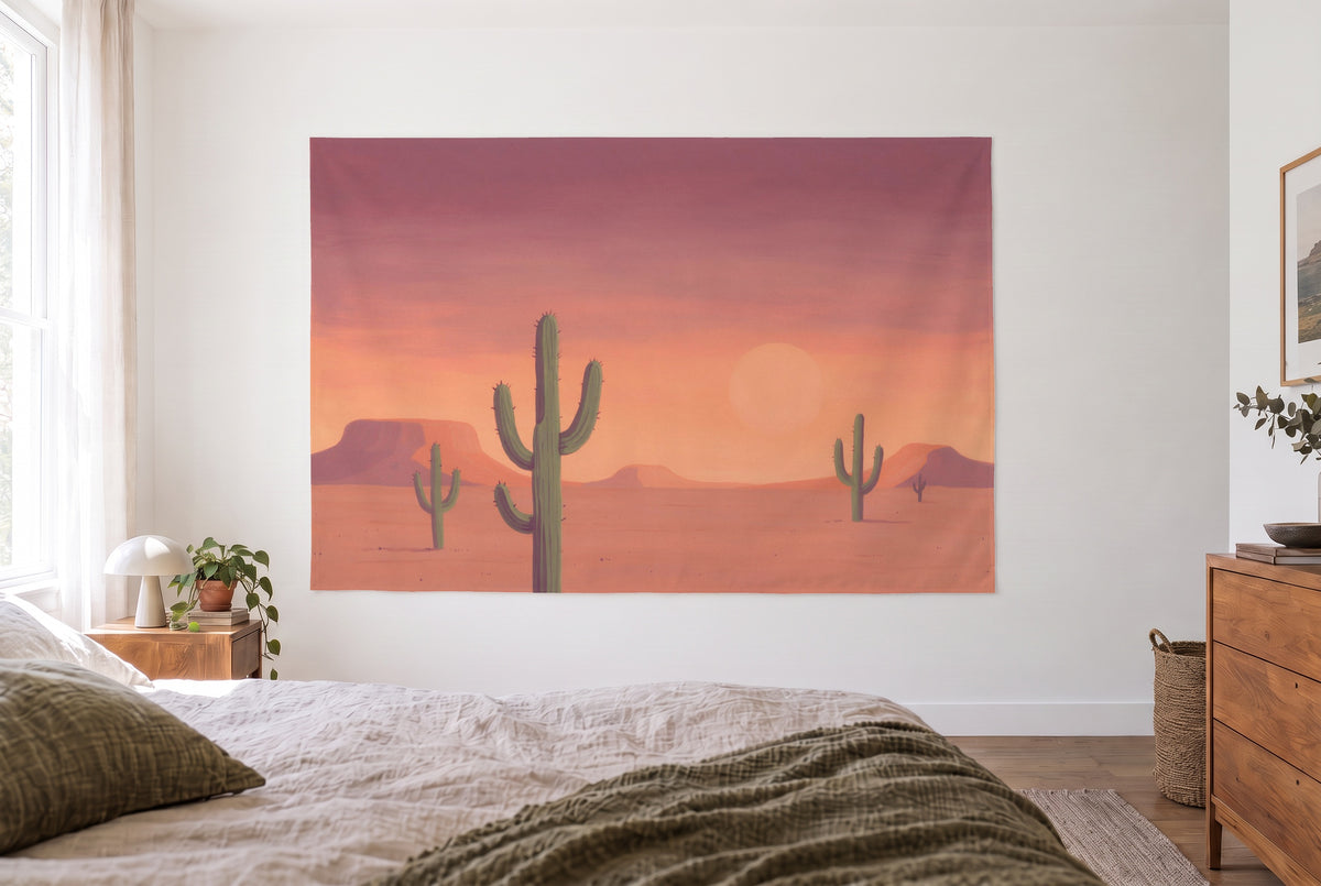 Cacti in the evening desert in gouache tapestry in a bright bedroom opposite the bed, wooden dresser on the right – peach