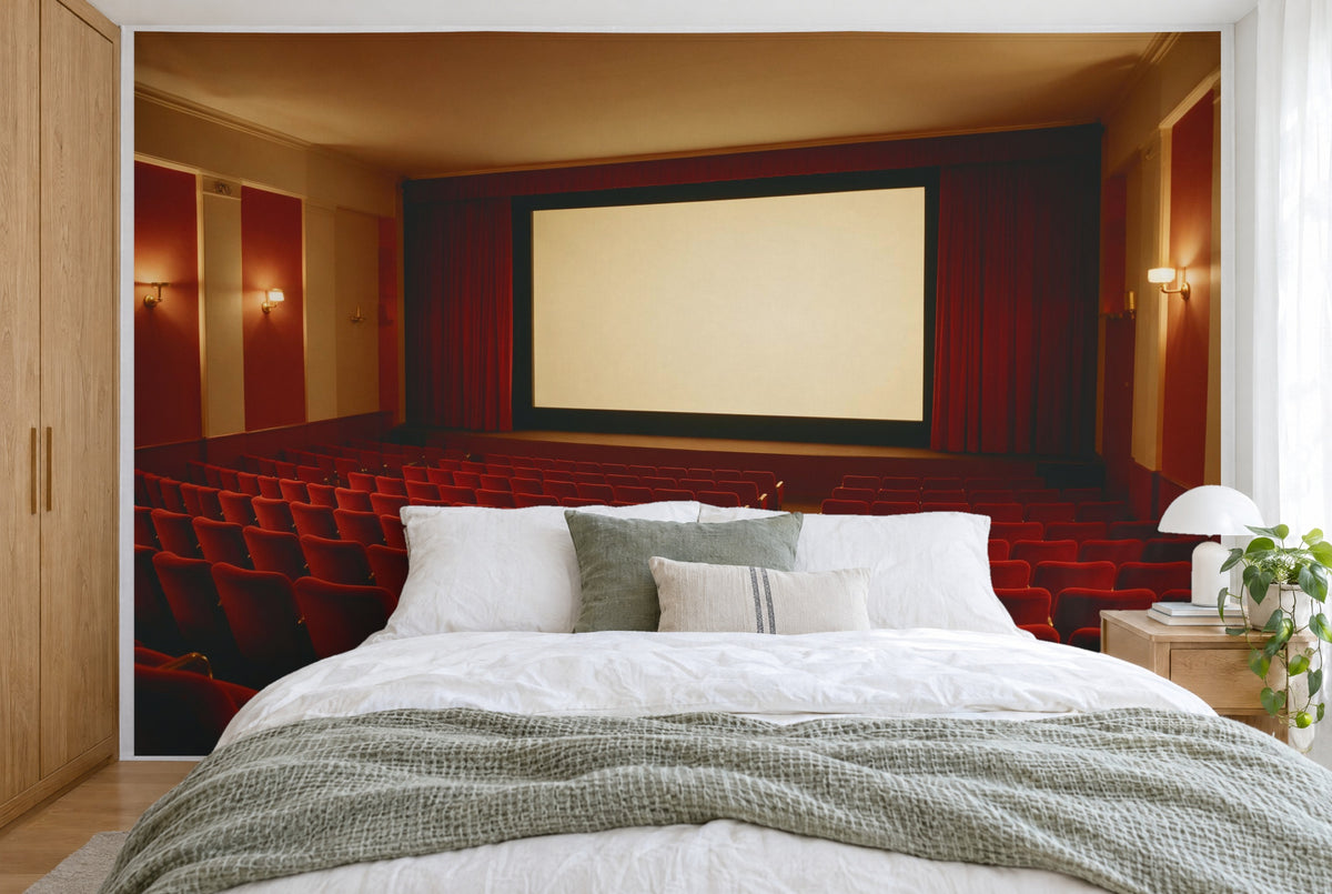XXL printed fabric: bright screen in the centre, red seat rows and curtains in the cinema, filling the wall behind the bed
