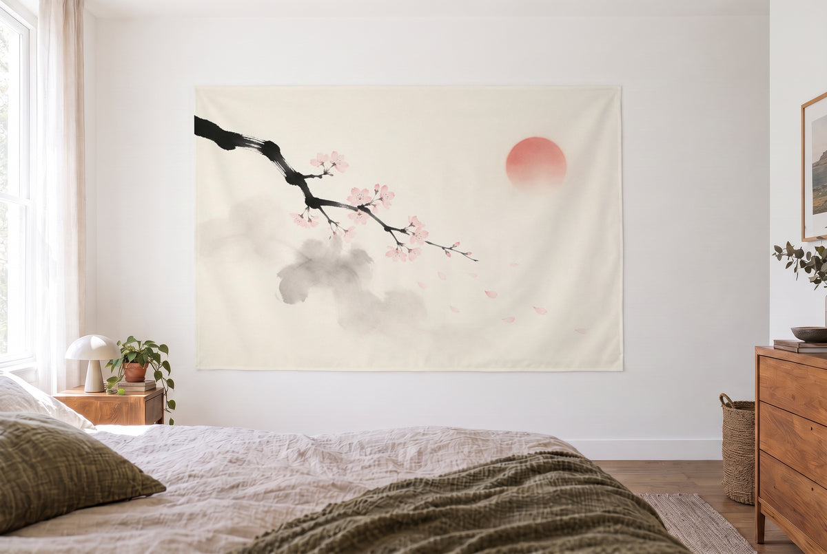 Cherry Blossom Branch in Ink tapestry in a bright bedroom opposite the bed, wooden dresser at right – cream and pink