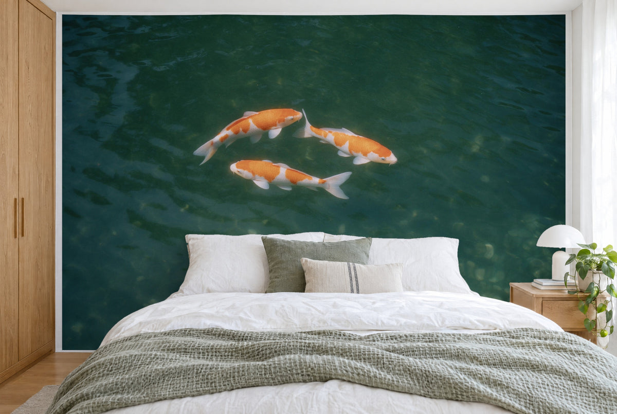 XXL printed fabric: three koi carp at the top slightly left of centre, green water, filling the wall behind the bed
