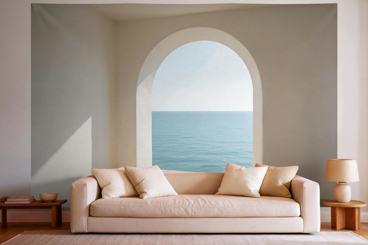 Tapiz de pared XXL Vista al mar por el arco abierto como decoración en un salón luminoso sobre el sofá