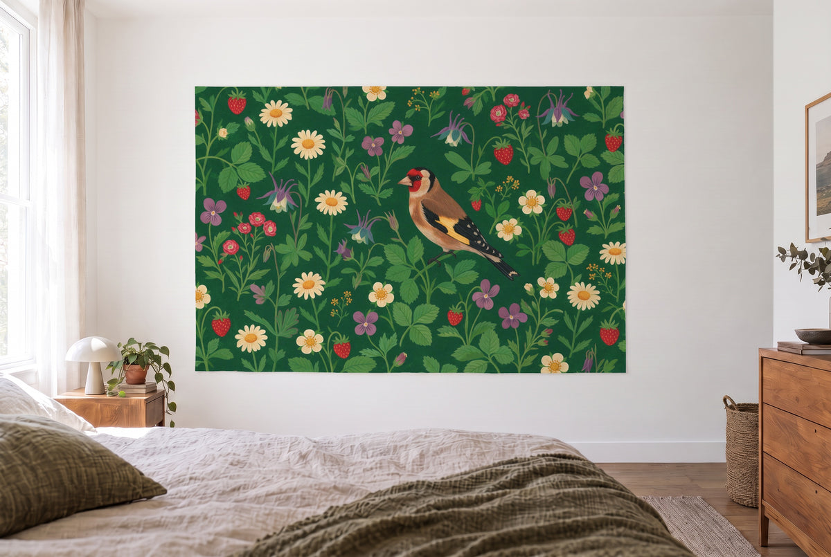Strewn flowers Distelfink tapestry in a bright bedroom opposite the bed, wooden chest on the right – red