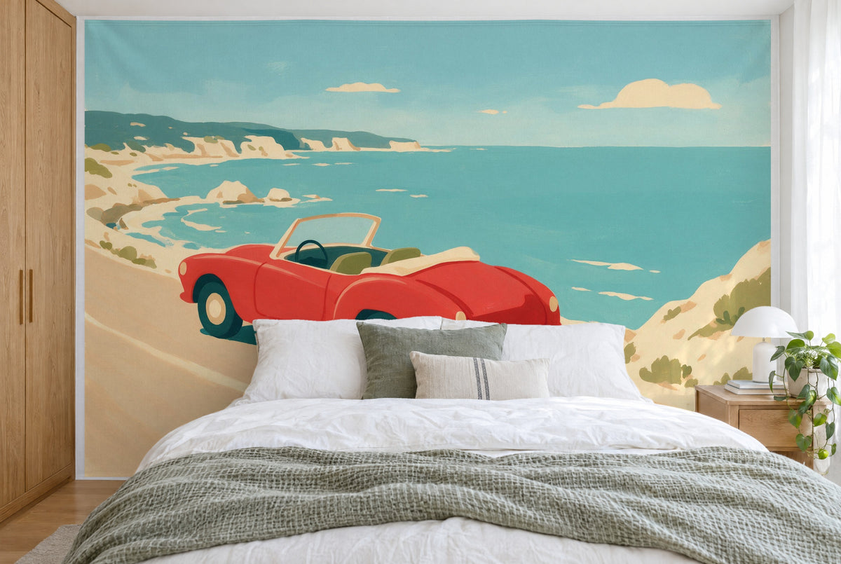 Bedruckter Stoff im XXL-Format: rotes Cabrio links der Mitte vor türkisblauem Meer und Felsen, wandfüllend hinter dem Bett