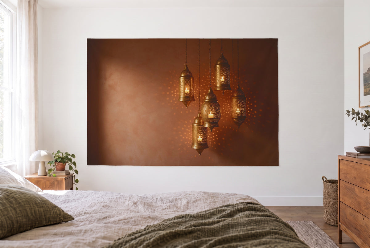 Oriental brass lanterns tapestry in a bright bedroom opposite the bed, wooden dresser at right – gold and brown