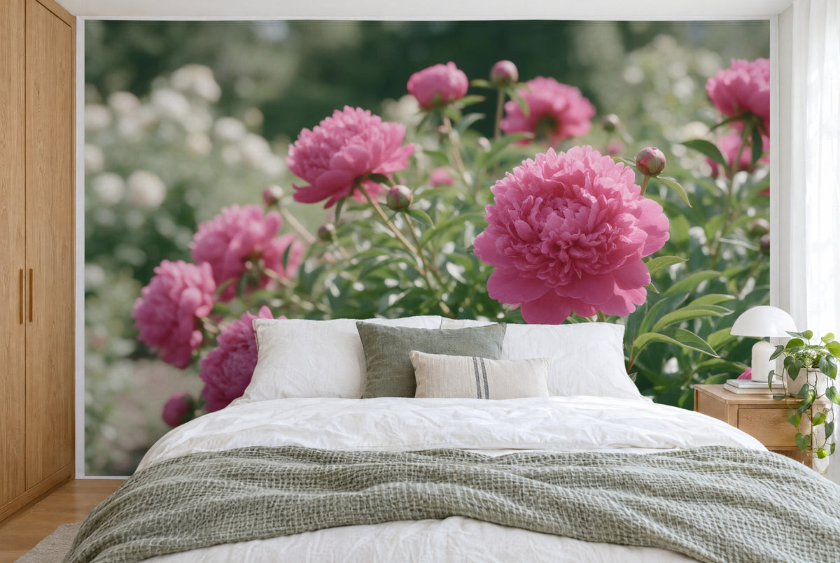 XXL printed fabric: large pink blossom right of centre, further blossoms on the left, filling the wall behind the bed