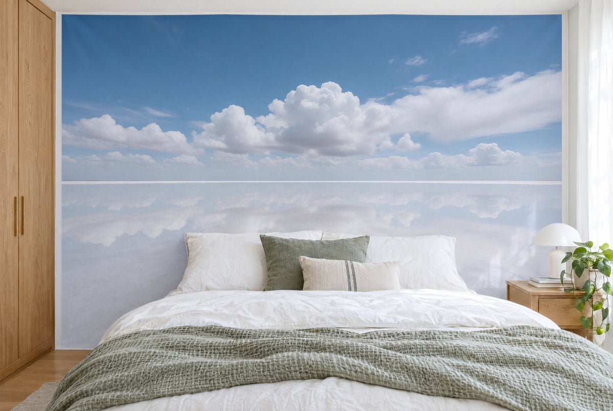 XXL printed fabric: white cloud bank in the centre over a mirroring salt flat, filling the wall behind the bed