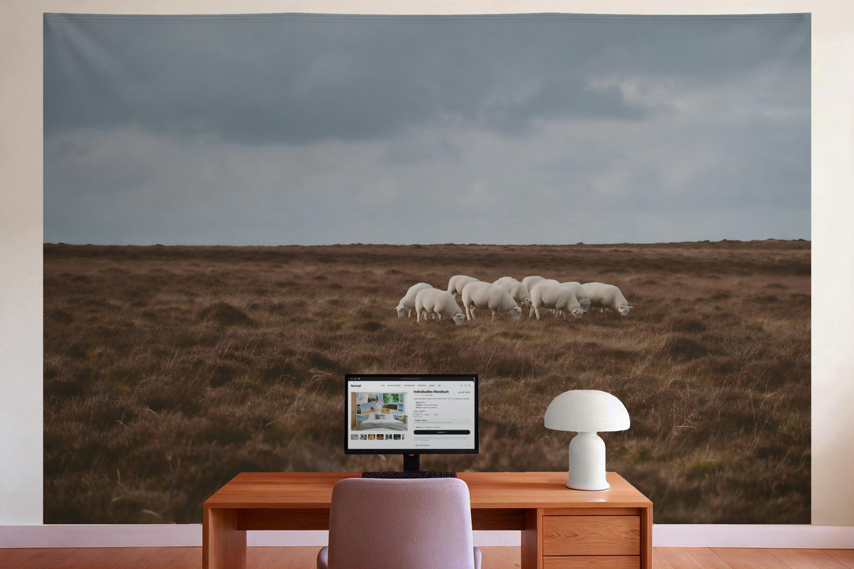 Wall decor in a home office behind the desk: printed fabric tapestry Sheep on the Heath