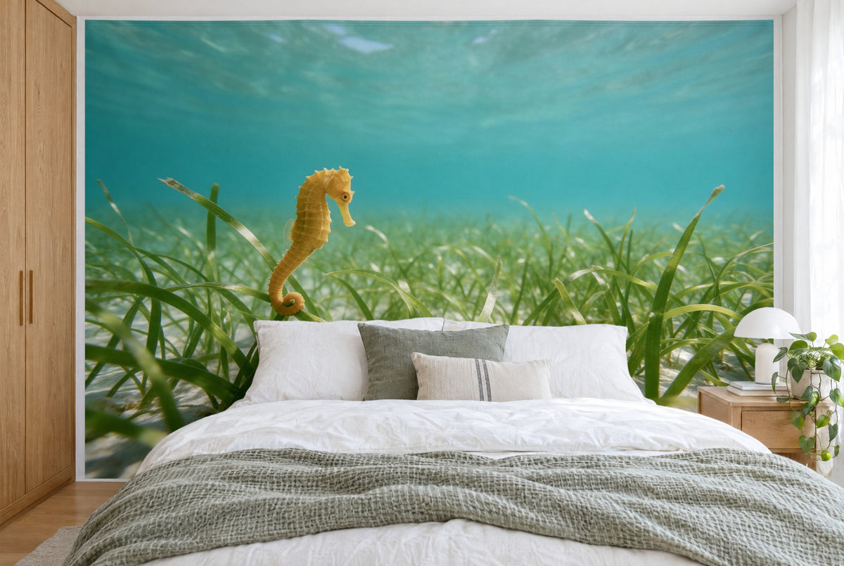 XXL printed fabric: seahorse on the left in green seagrass under turquoise water, filling the wall behind the bed