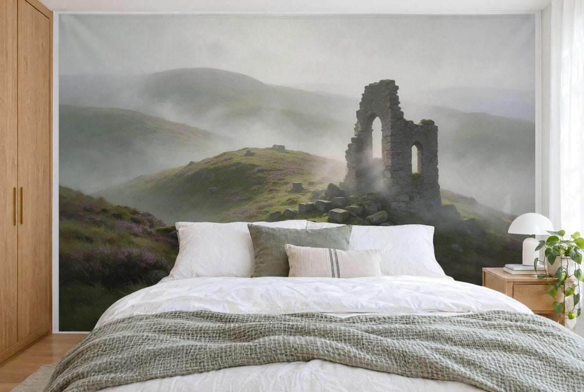 XXL printed fabric: stone ruin on the right on a hill, flowering heather on the left, filling the wall behind the bed