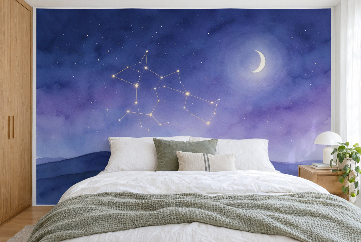 XXL printed fabric: golden constellations on the left, crescent moon top right above hills, filling the wall behind the bed