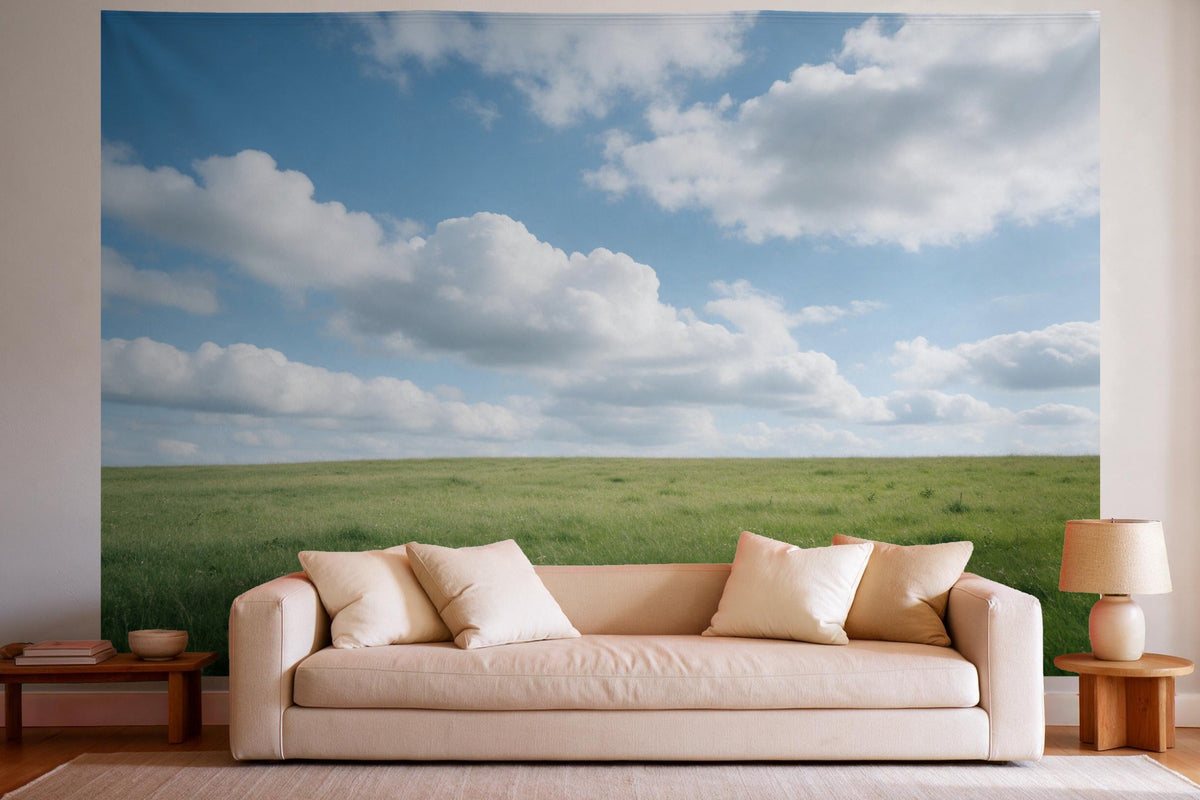 Tenture murale XXL Ciel nuageux bleu sur prairie d'été en déco murale dans un salon lumineux au-dessus du canapé