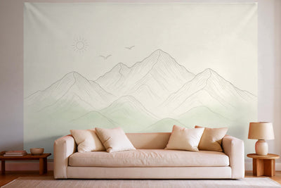 Déco murale dans un salon lumineux au-dessus du canapé : tenture murale Paysage de montagne en line art, imprimée sur tissu