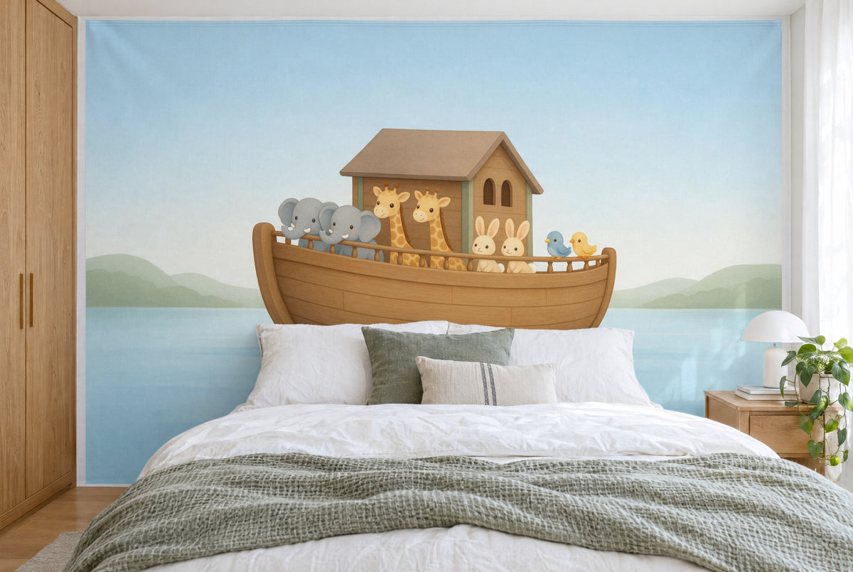 XXL printed fabric: wooden ark with eight animals centred above the pillows, green hills, filling the wall behind the bed