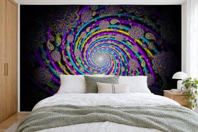 XXL printed fabric: glowing color spiral at center, paisley flowers all around on black, full wall behind the bed