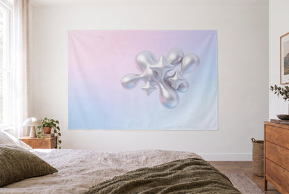 Y2K chrome shapes tapestry in silver and pink in a bright bedroom opposite the bed, wooden dresser at right