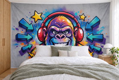 XXL printed fabric: a gorilla with headphones, 3D arrows and yellow stars, filling the wall behind the double bed