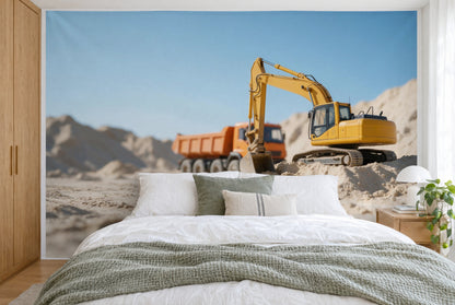 Bedruckter Stoff im XXL-Format: gelber Bagger rechts am Sandhügel, oranger Kipplaster, wandfüllend hinter dem Bett