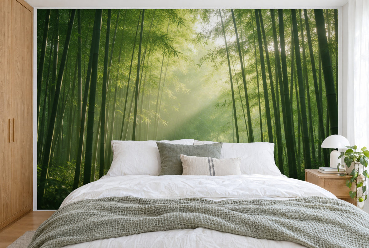 XXL printed fabric: tall bamboo stalks with rays of light in the center, dense green, filling the wall behind the bed
