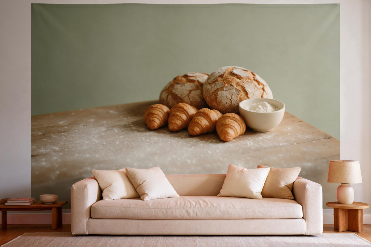 Wandtuch XXL Bauernbrot und Croissants als Wanddeko im hellen Wohnzimmer über dem Sofa