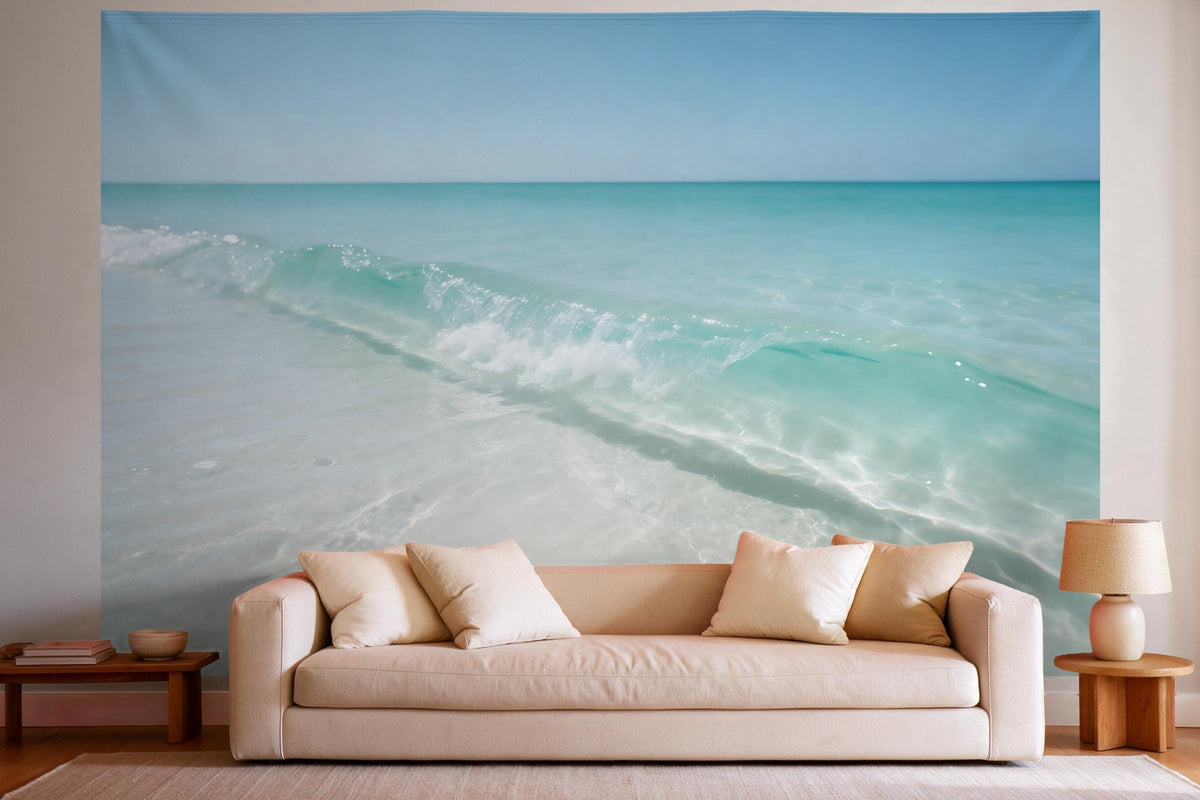 Tapiz de pared XXL Ola rompiente en playa de arena como decoración en un salón luminoso sobre el sofá