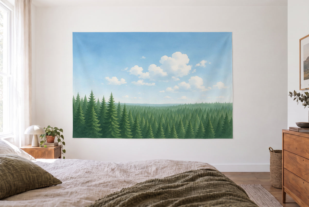 Wandtuch Fichtenwald unter Cumuluswolken im hellen Schlafzimmer gegenüber dem Bett, rechts eine Holzkommode – Grün und Blau