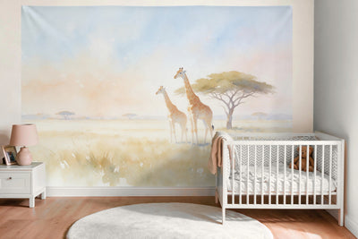 Wall decor in the nursery above the crib: printed fabric tapestry Giraffes Under Acacias in Watercolor