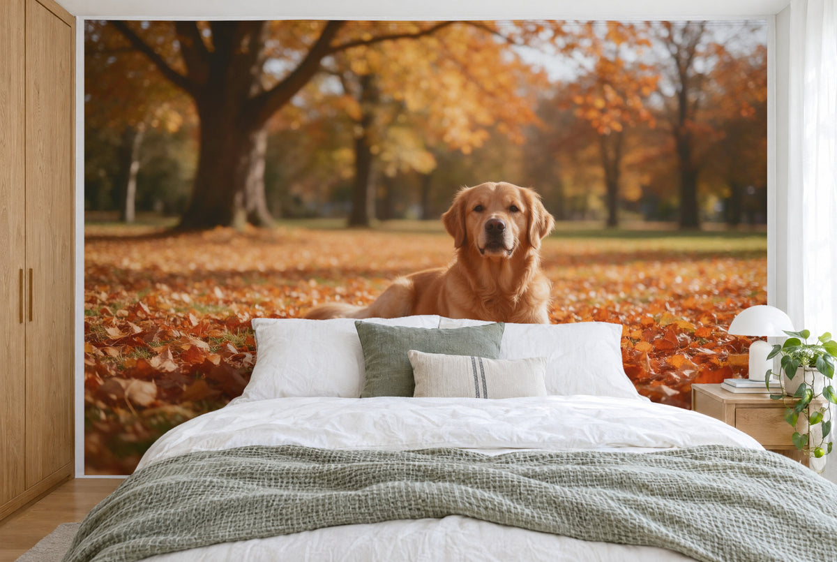 XXL printed fabric: golden retriever right of centre in the leaves, an old tree on the left, filling the wall behind the bed