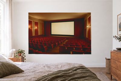 Empty cinema red seats tapestry in the bright bedroom opposite the bed, wood dresser on the right – red and gold