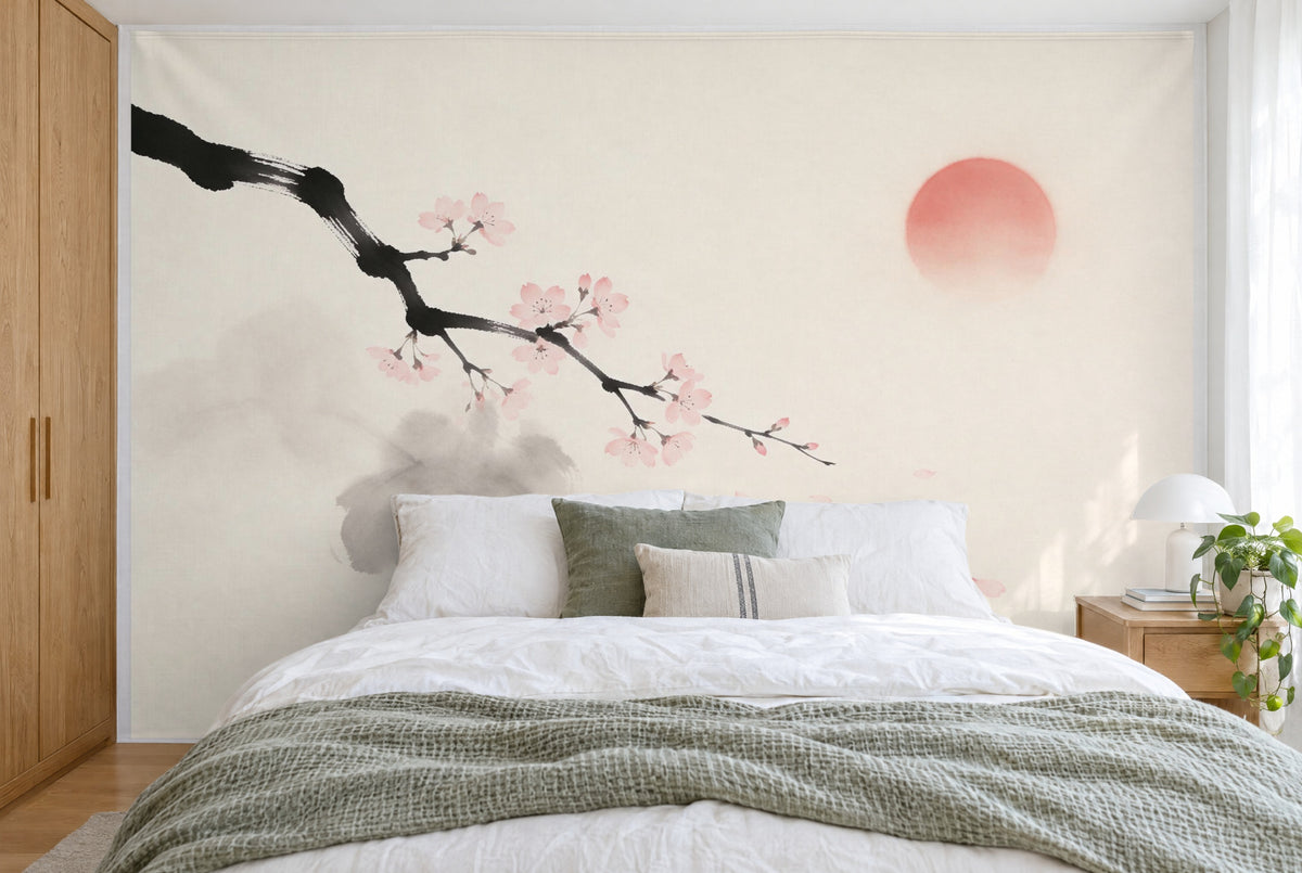 XXL printed fabric: cherry blossom branch at upper left, a pale reddish sun at right, filling the wall behind the bed