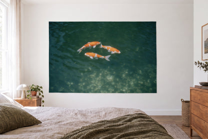 Koi Carp from Above tapestry in a bright bedroom opposite the bed, a wooden dresser on the right – orange and deep green
