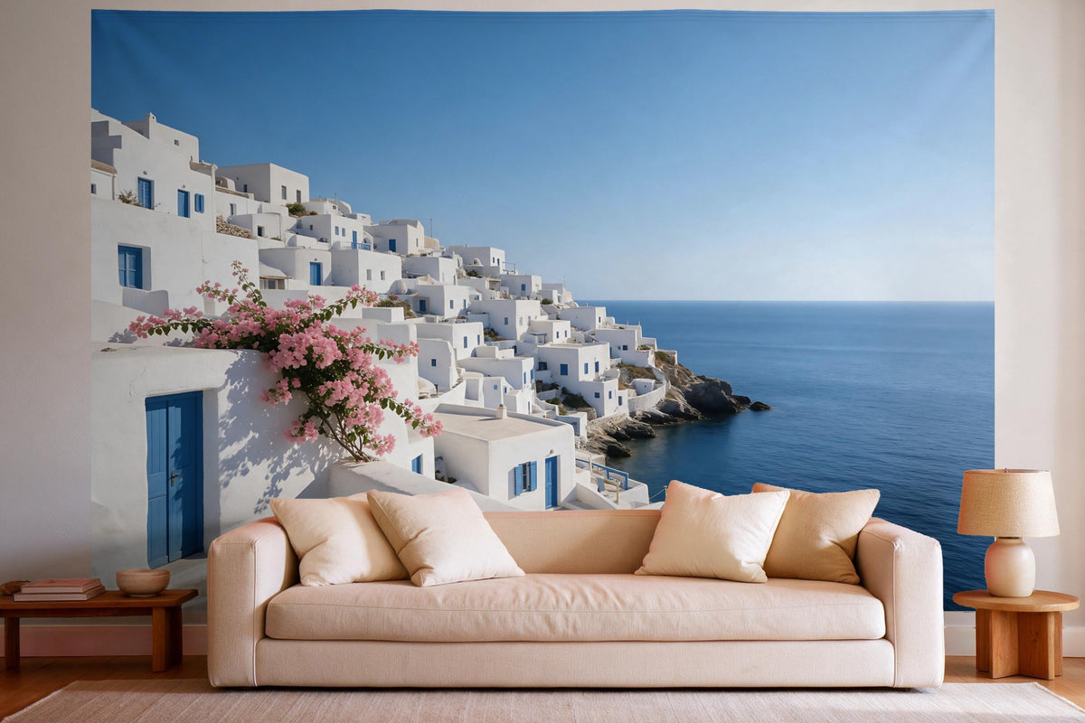Tapiz de pared XXL Pueblo costero blanco en Grecia como decoración en un salón luminoso sobre el sofá