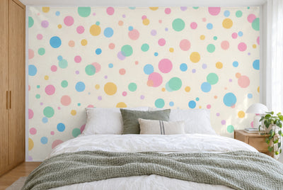 XXL printed fabric: large dots right of center, small dots all around on cream, filling the wall behind the bed