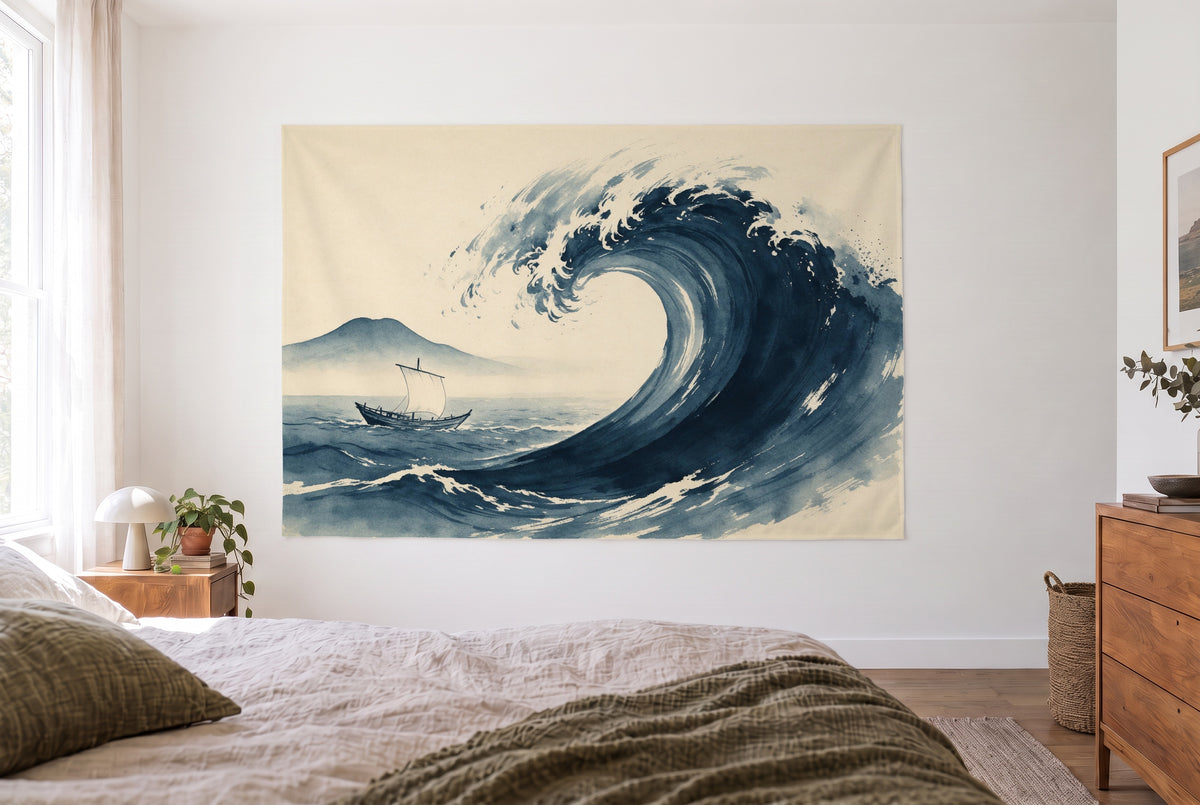 Giant Wave in Japanese Ink tapestry in a bright bedroom opposite the bed, wooden dresser on the right – indigo and cream