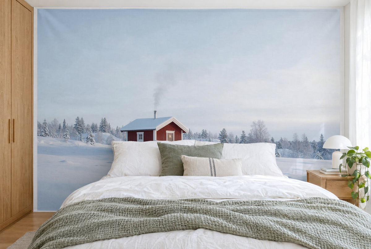 XXL printed fabric: red sauna cabin left of centre, wide winter sky above, filling the wall behind the bed