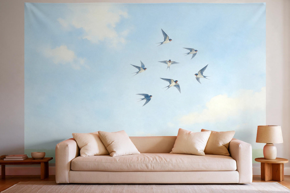 XXL wall tapestry Swallows in Flight as wall decor in a bright living room above the sofa