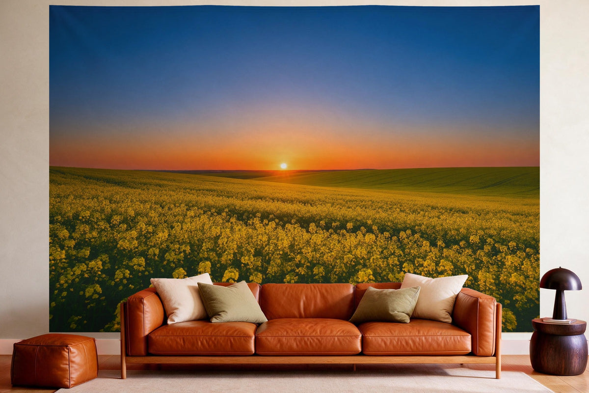 XXL wall tapestry Rising Sun over the Rapeseed Field as wall decor in a cosy living room above the leather sofa