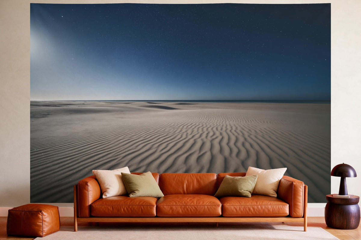 Tapiz de pared XXL Cielo estrellado sobre playa de dunas como decoración en un salón acogedor sobre el sofá de cuero