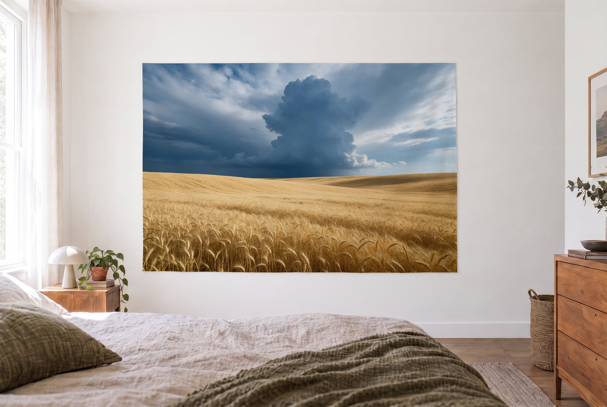 Wheat field before the storm tapestry in a bright bedroom opposite the bed, wooden dresser at right – yellow and grey