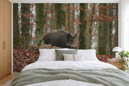 XXL printed fabric: wild sow with piglets left of centre between beech trunks, full wall behind the bed