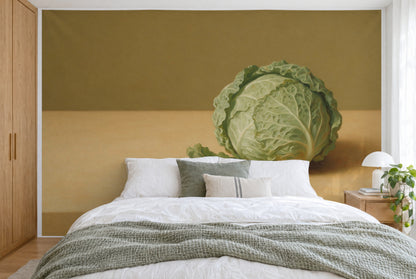 Tissu imprimé XXL : chou de Milan à droite au-dessus des coussins, brun olive calme à gauche, mur entier derrière le lit