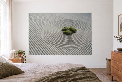 Zen garden with raked gravel tapestry in a bright bedroom opposite the bed, wooden dresser at right – grey and green